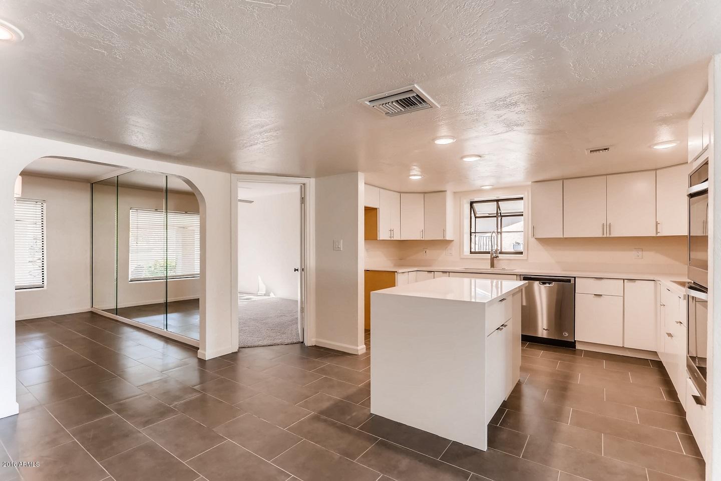 102 West Thunderbird Road Phoenix, AZ 85023 - Photo 29 of 38 Kitchen into Dining and Fourth Bedroom
