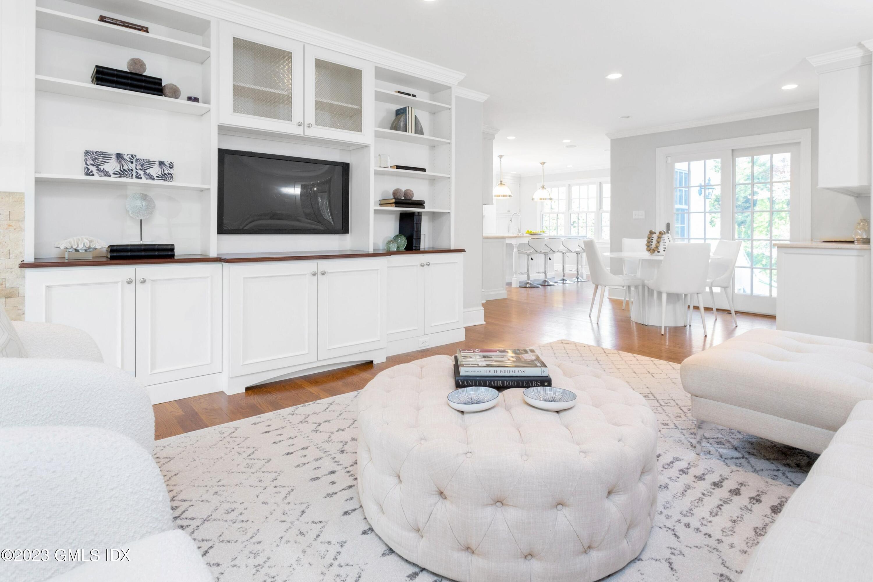 7 Colonial Lane Riverside, CT 06878 - Photo 2 of 27 a living room with furniture and a flat screen tv
