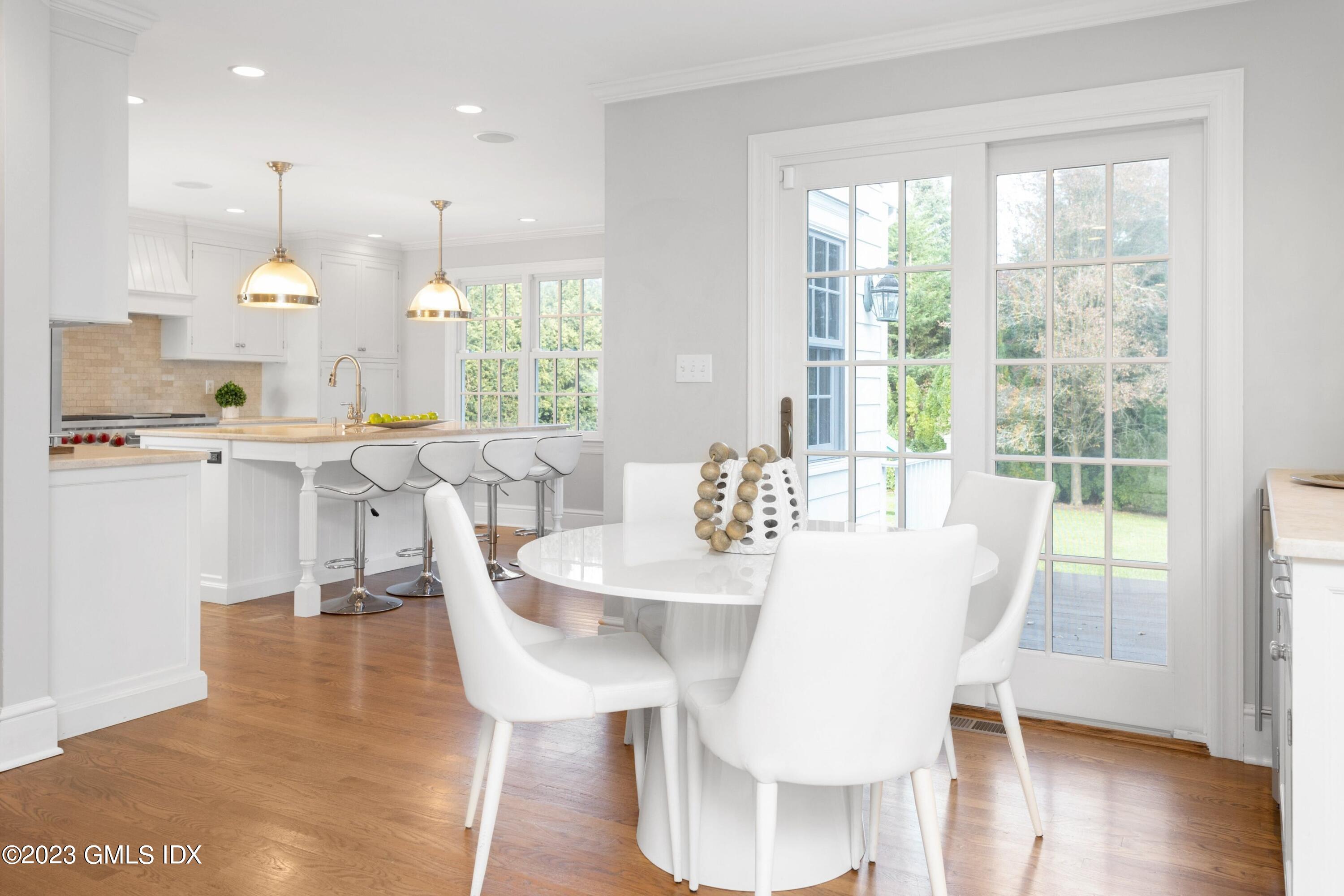 7 Colonial Lane Riverside, CT 06878 - Photo 4 of 27 a view of a dining room with furniture window and wooden floor
