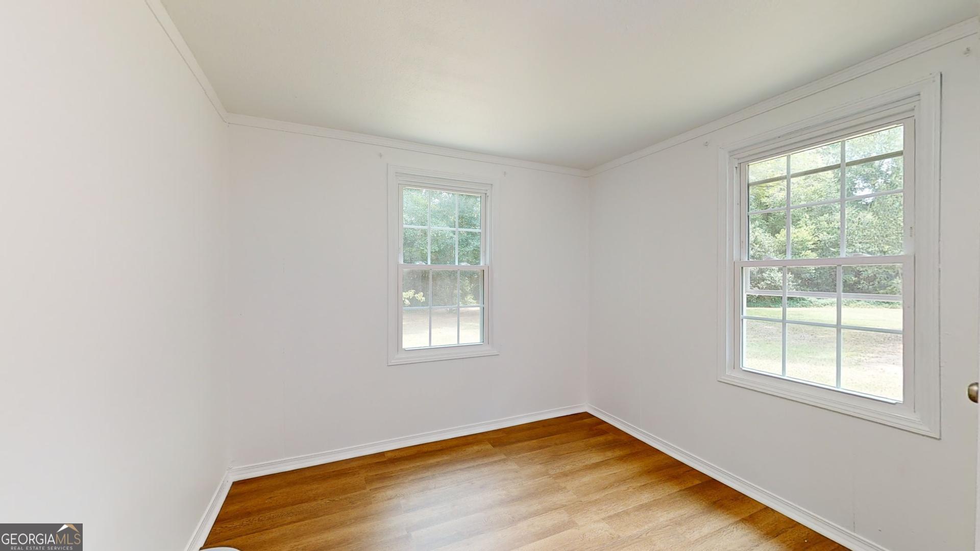 623 Virginia Avenue Millen, GA 30442 - Photo 16 of 34 a view of empty room with window