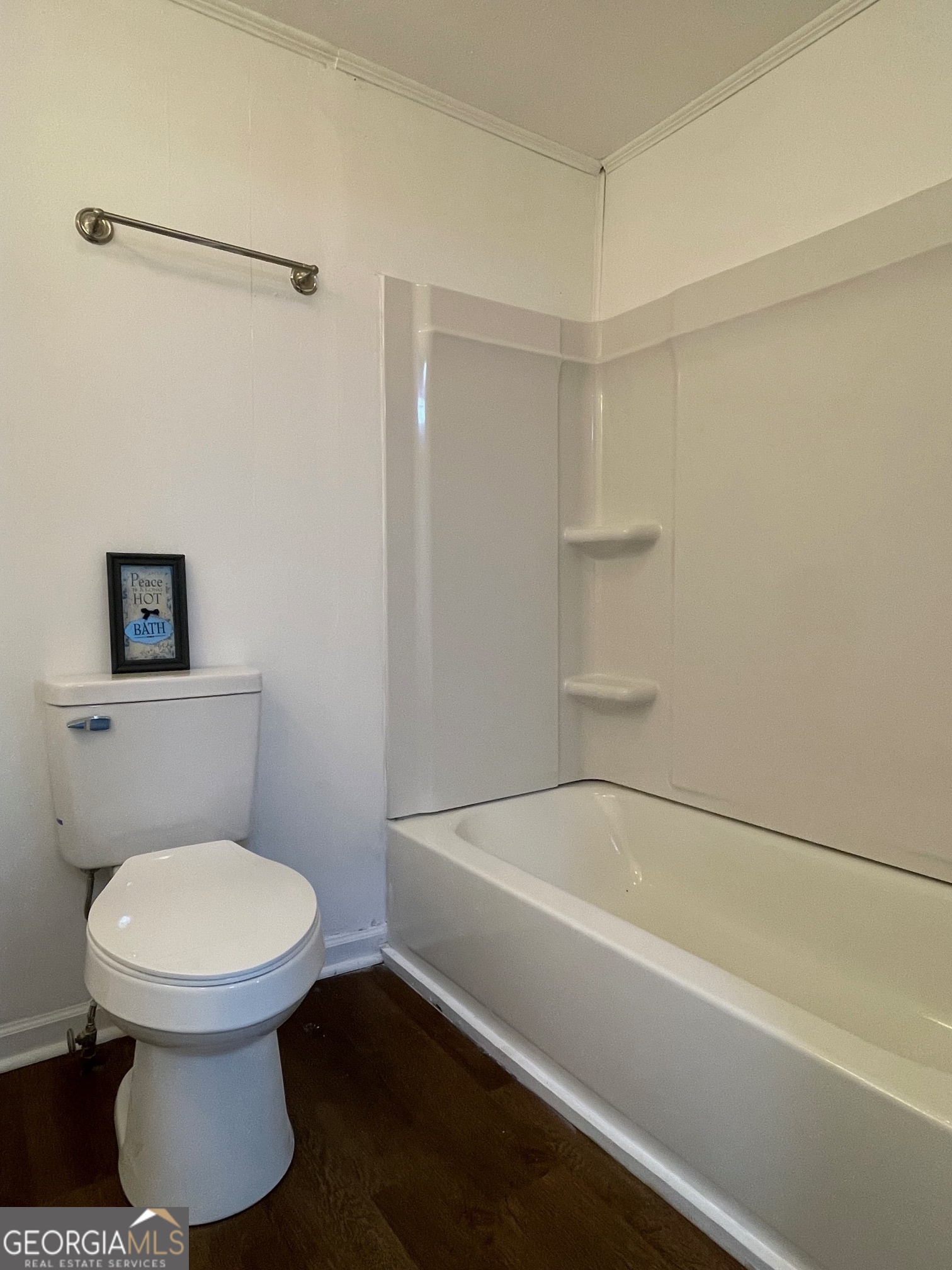 623 Virginia Avenue Millen, GA 30442 - Photo 30 of 34 a bathroom with a toilet and a shower
