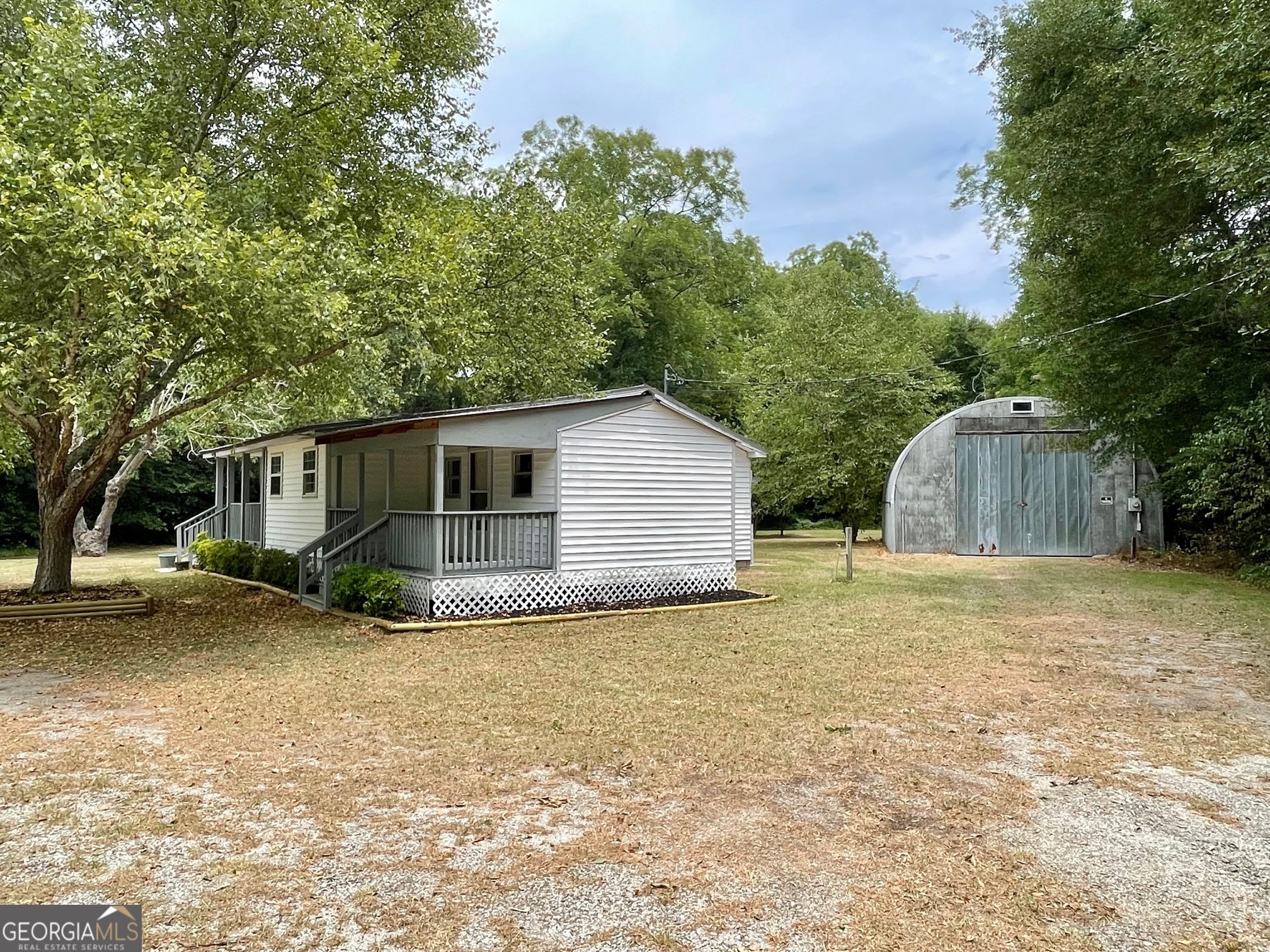 623 Virginia Avenue Millen, GA 30442 - Photo 33 of 34 a view of a house with a yard