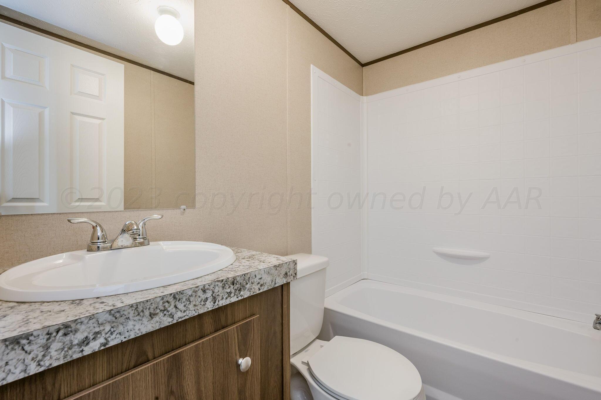 8300 South Blessen Road Amarillo, TX 79119 - Photo 19 of 32 Hall Bathroom
