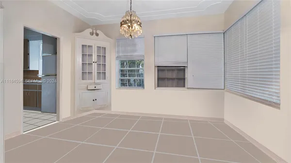 a kitchen with a stove and a refrigerator