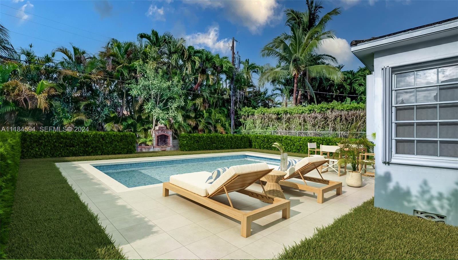 535 West 51st Street Miami Beach, FL 33140 - Photo 29 of 40 a view of swimming pool with chairs and plants