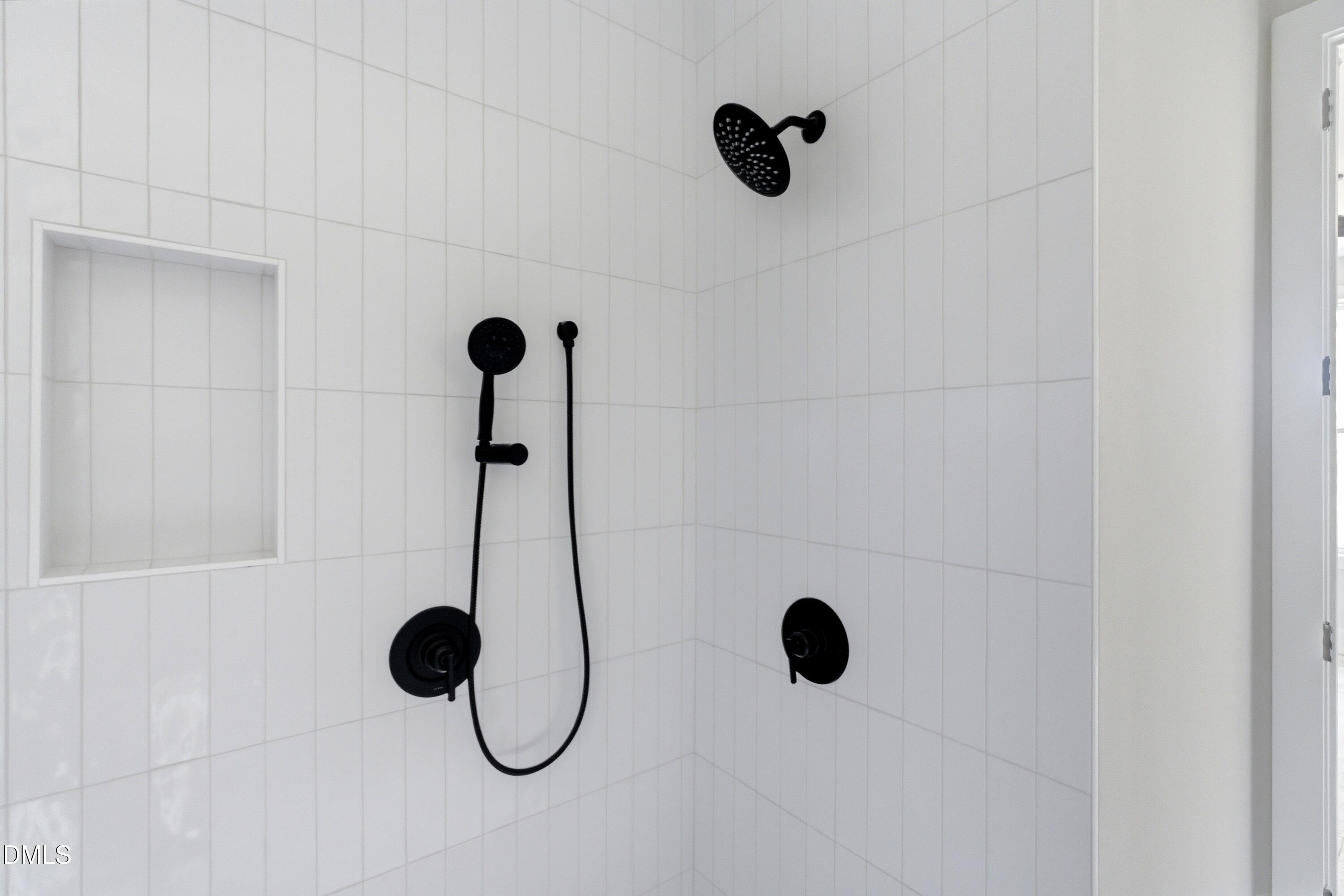 720 Noble Town Way, Unit 105 Raleigh, NC 27603 - Photo 12 of 23 a bathroom with a shower