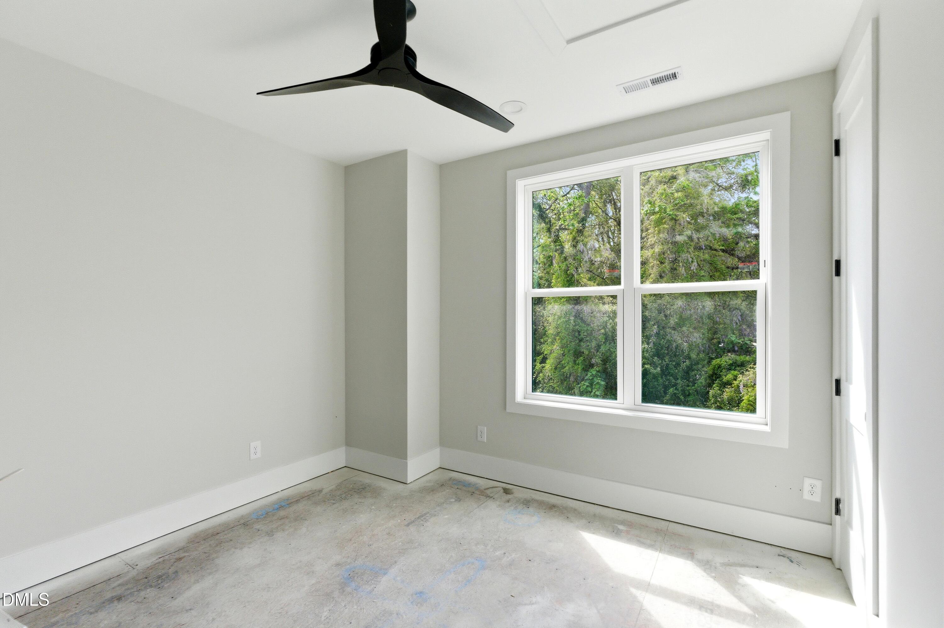 720 Noble Town Way, Unit 105 Raleigh, NC 27603 - Photo 14 of 23 an empty room with a window