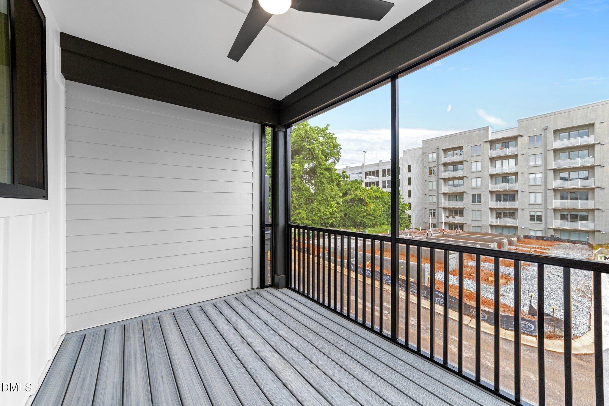 720 Noble Town Way, Unit 105 Raleigh, NC 27603 - Photo 21 of 35 a view of balcony with wooden floor