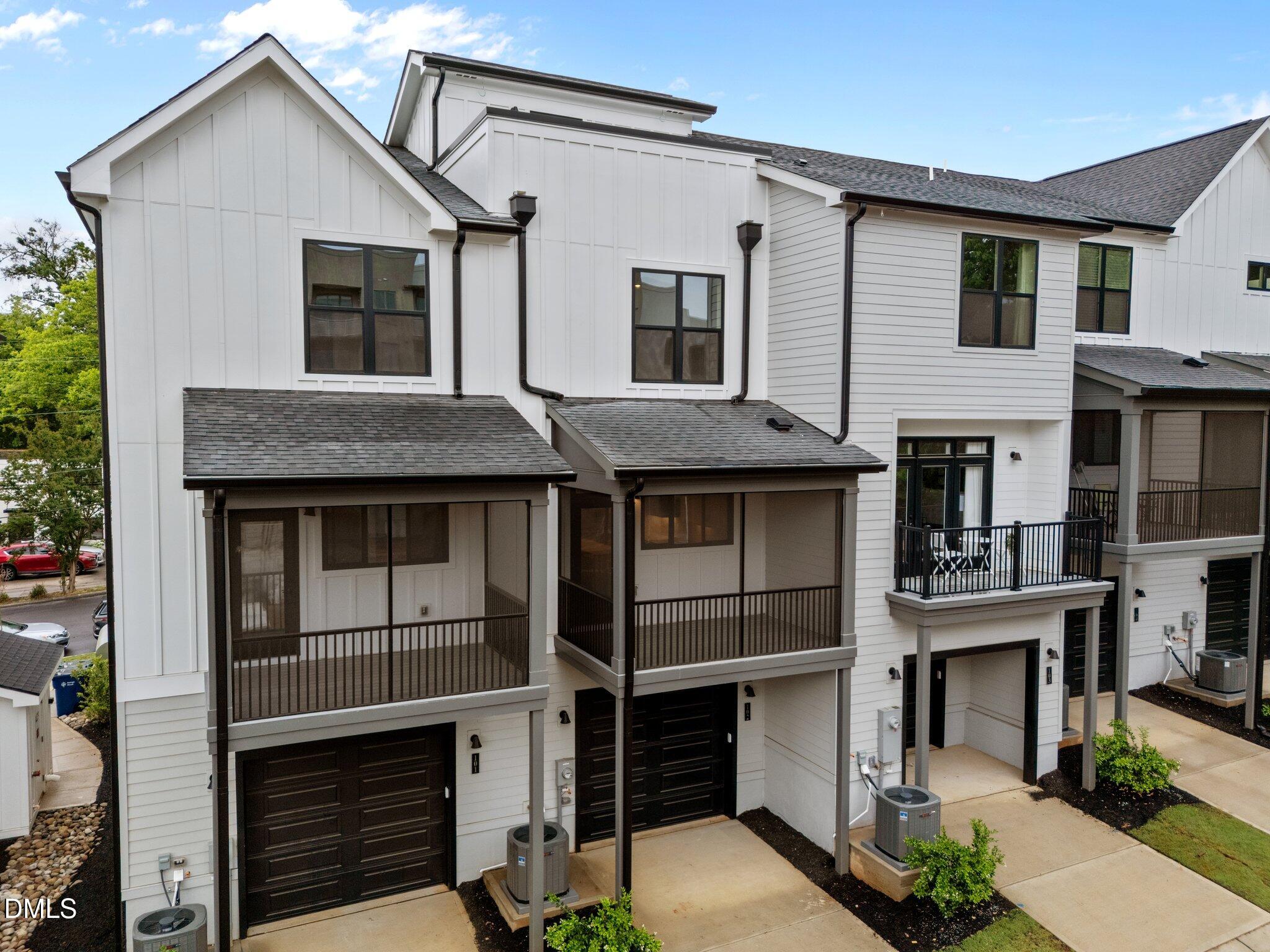 720 Noble Town Way, Unit 105 Raleigh, NC 27603 - Photo 27 of 35 a front view of a house with a garage