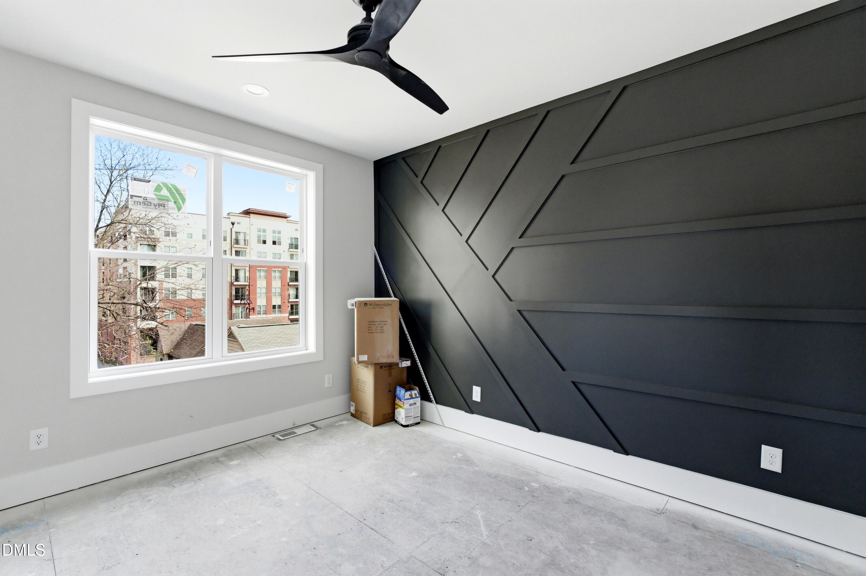 720 Noble Town Way, Unit 105 Raleigh, NC 27603 - Photo 10 of 23 a view of empty room with windows