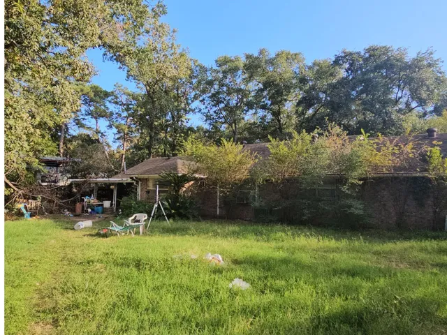 a view of a house with a garden