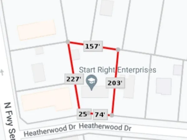 a view of street with parked cars