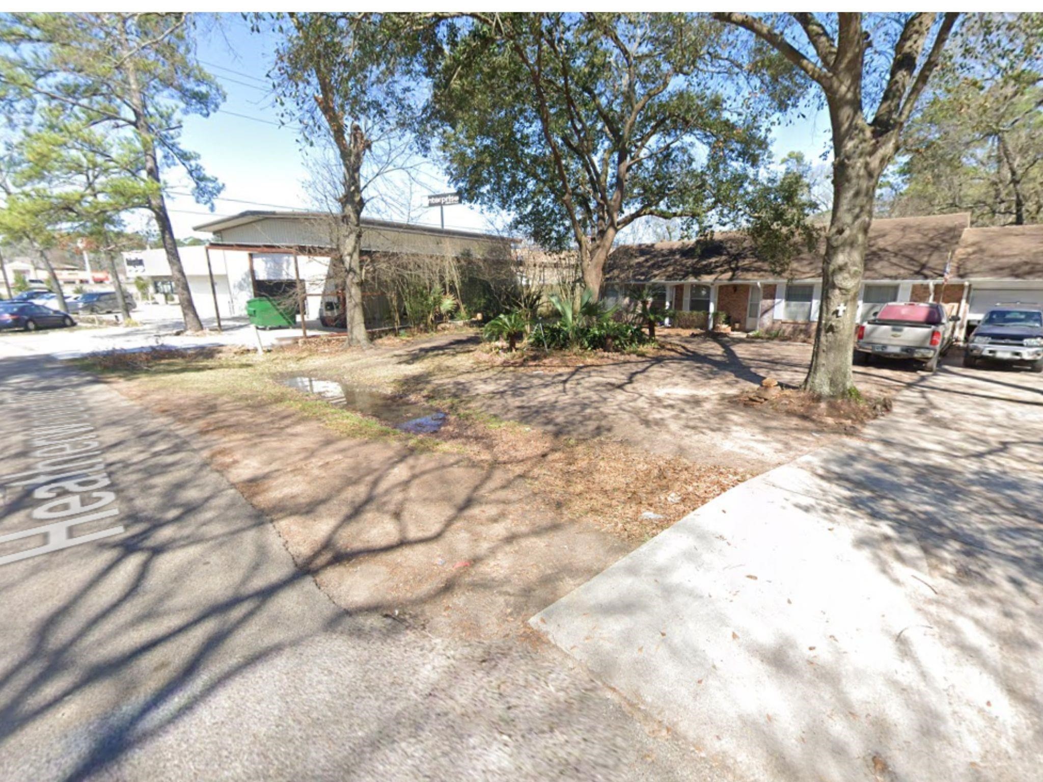 119 Heatherwood Drive Spring, TX 77386 - Photo 8 of 16 a view of street with parked cars