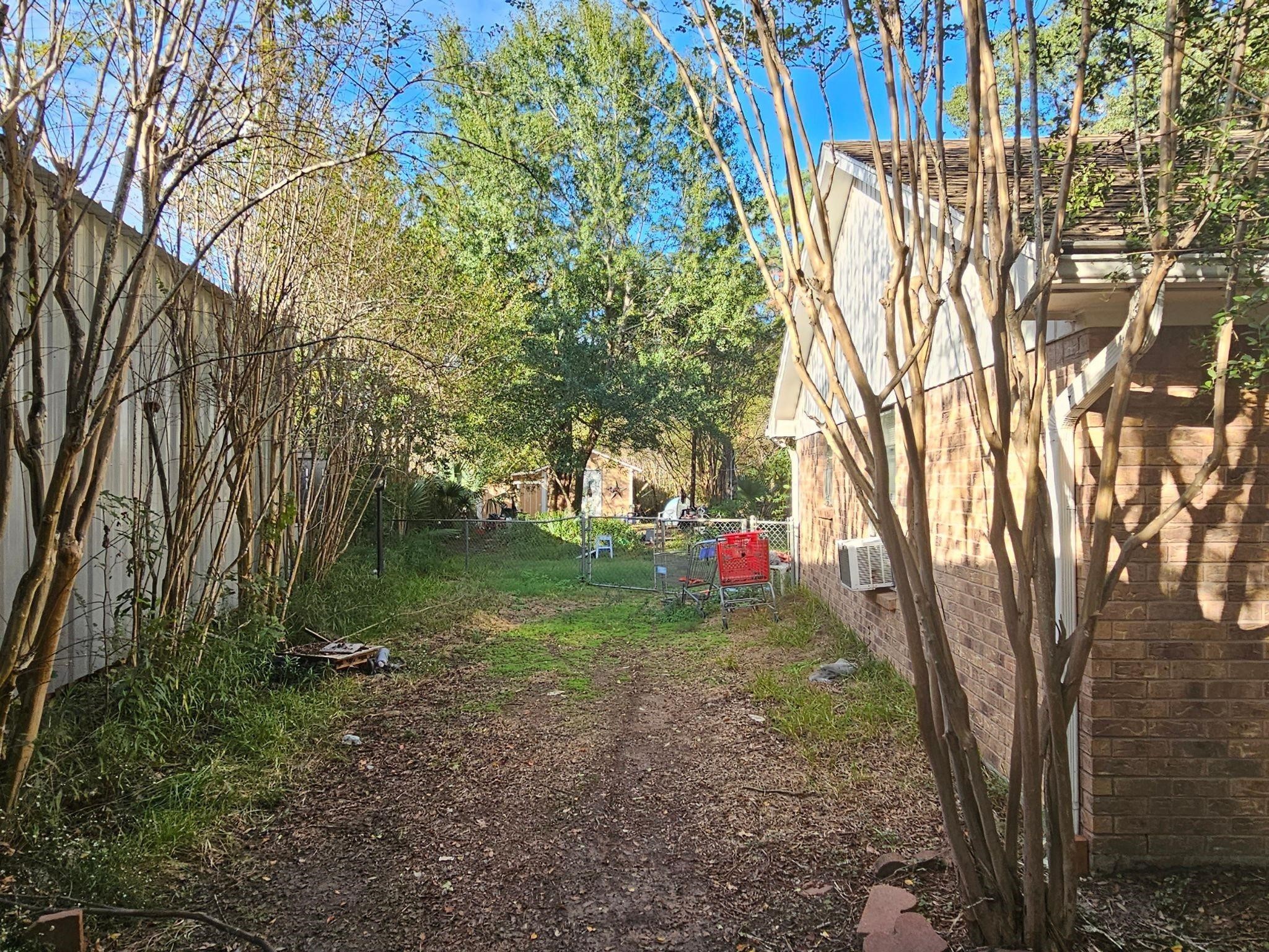 119 Heatherwood Drive Spring, TX 77386 - Photo 10 of 16 a view of a park with large trees