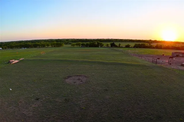 a view of a lake with a big yard
