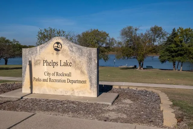 a sign on the side of the road