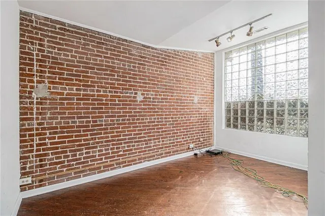 a view of a blue wall with windows