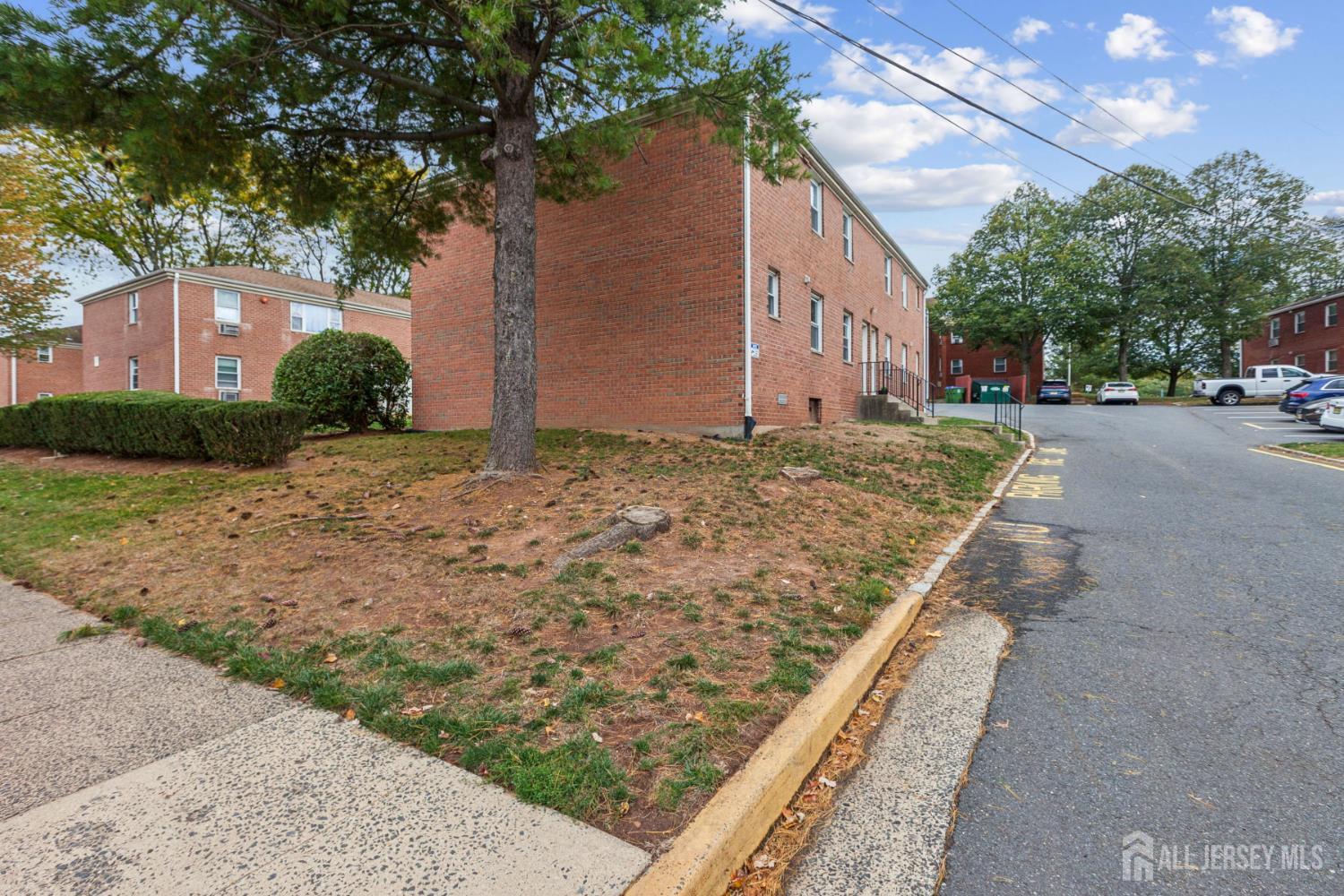 37 York Drive, Unit 6A Edison, NJ 08817 - Photo 20 of 20 a view of a house with a yard
