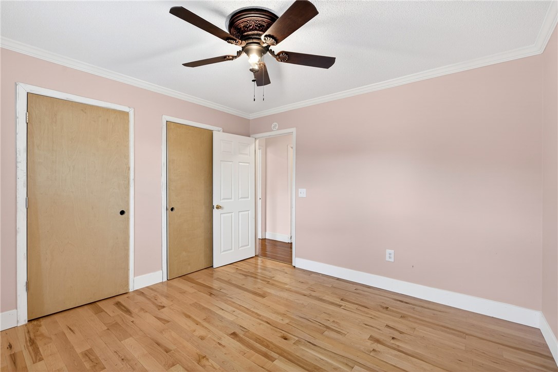 160 Burdette Circle Pendleton, SC 29670 - Photo 21 of 38 This spacious bedroom features lustrous hardwood floors and ample closet space.