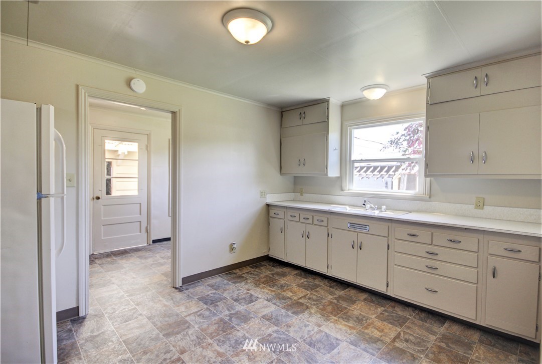 2353 Grandview Road Ferndale, WA 98248 - Photo 13 of 40 a bathroom with a granite countertop sink mirror and a