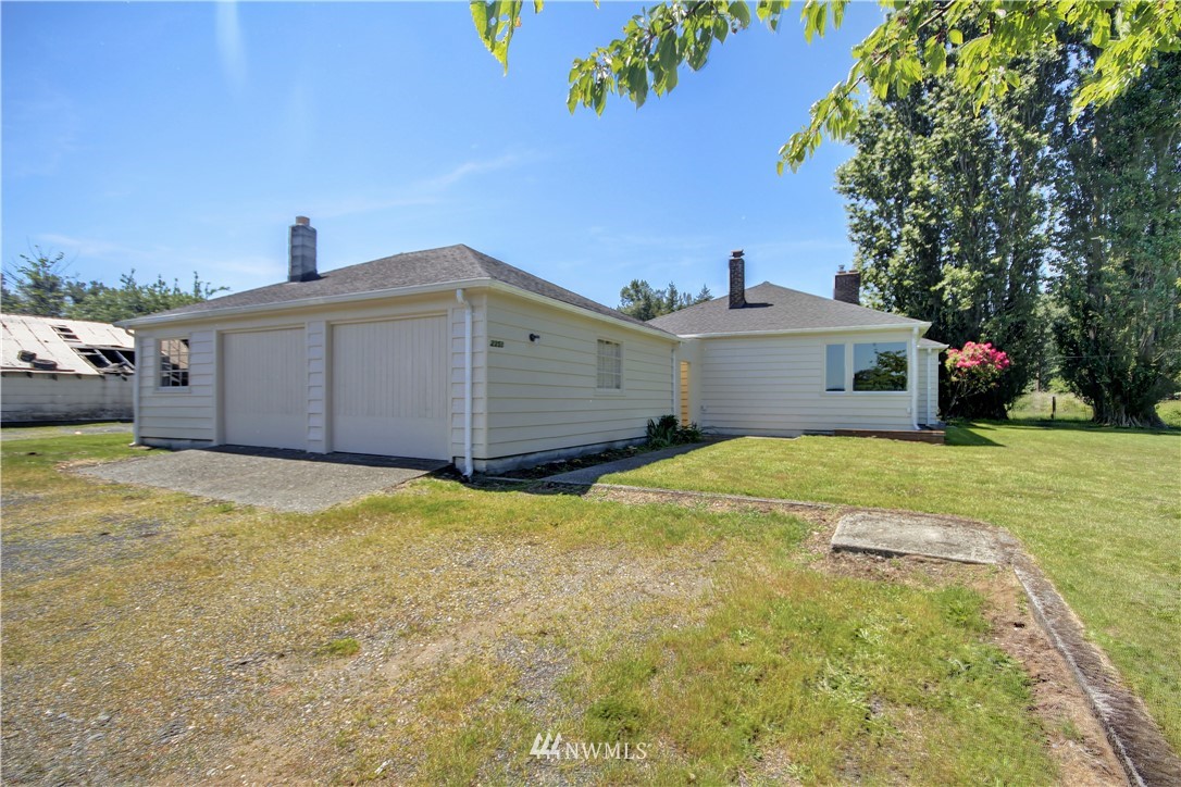 2353 Grandview Road Ferndale, WA 98248 - Photo 3 of 40 a front view of a house with a yard