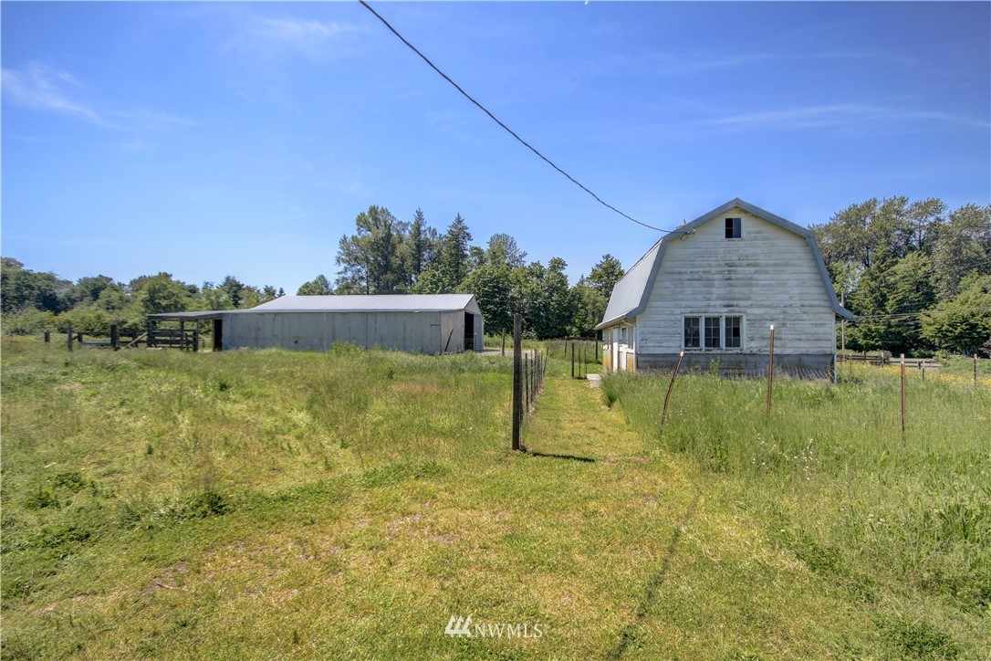 2353 Grandview Road Ferndale, WA 98248 - Photo 27 of 40 a swimming pool with trees in the background