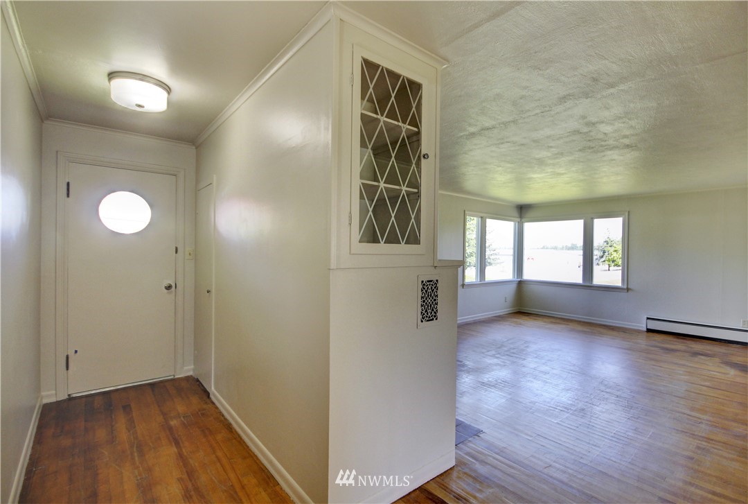 2353 Grandview Road Ferndale, WA 98248 - Photo 5 of 40 a view of livingroom with hardwood floor and window