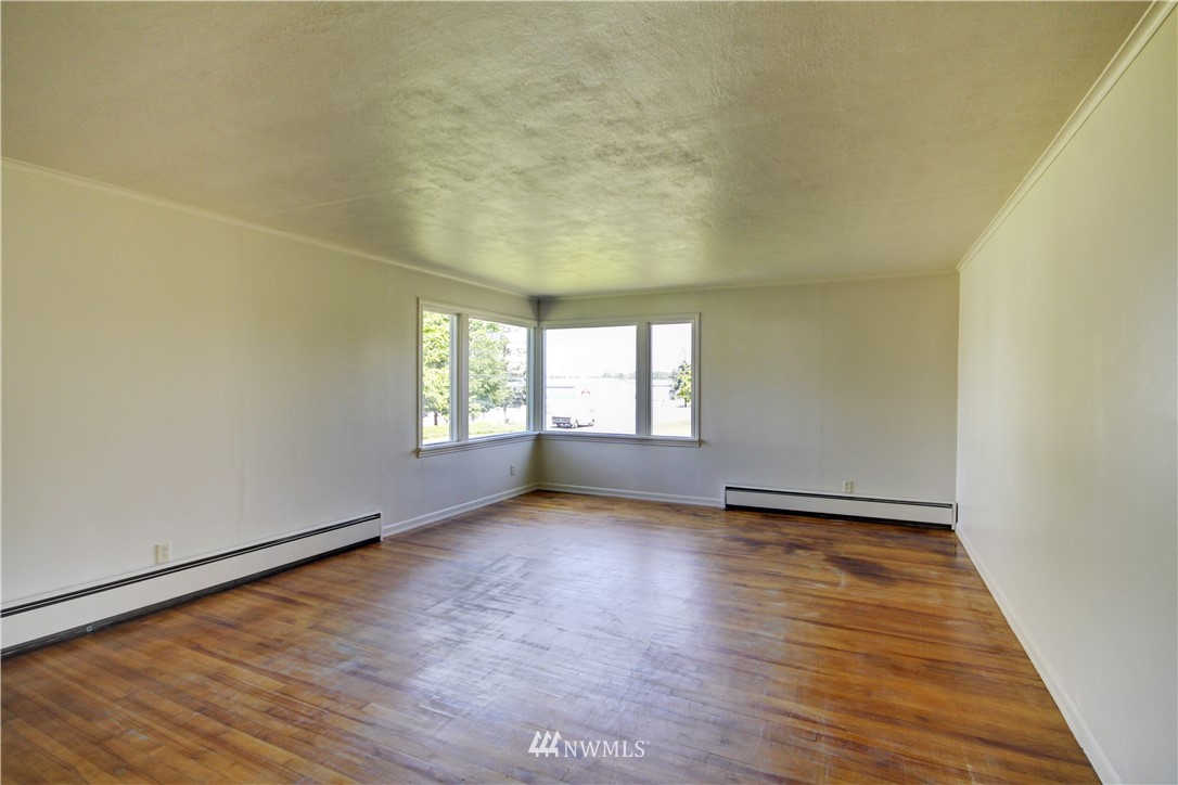 2353 Grandview Road Ferndale, WA 98248 - Photo 7 of 40 wooden floor in an empty room with a window