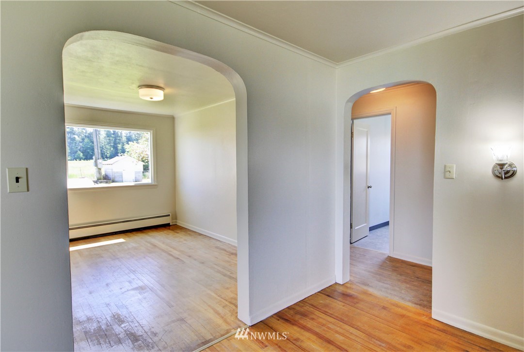2353 Grandview Road Ferndale, WA 98248 - Photo 10 of 40 a view of a room with wooden floor and cabinet