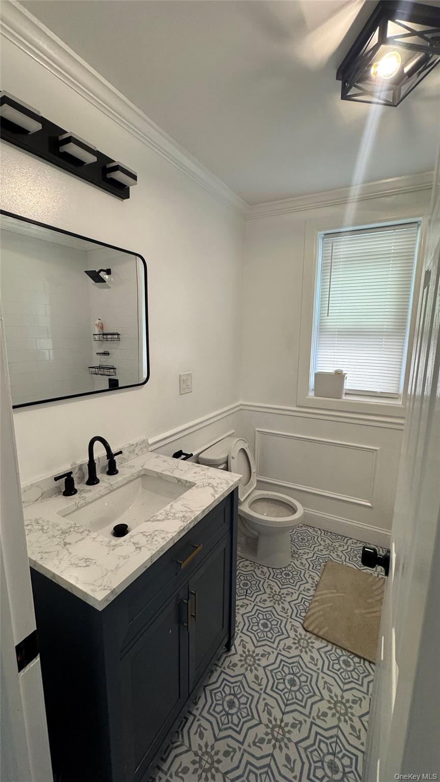153 Chester Street, Unit 2 AND 3 Mount Vernon, NY 10552 - Photo 11 of 11 a bathroom with a sink and a mirror