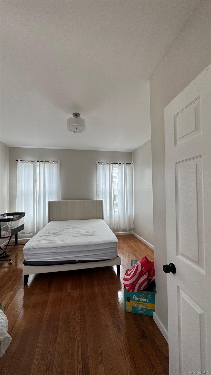 153 Chester Street, Unit 2 AND 3 Mount Vernon, NY 10552 - Photo 6 of 11 a bedroom with a bed and window