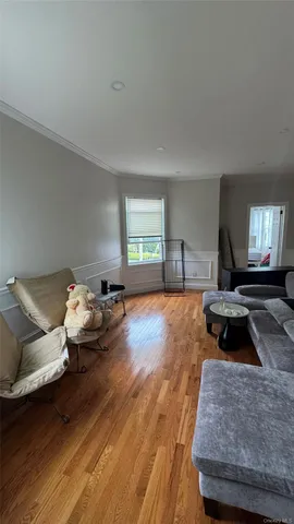 a bedroom with bed and window