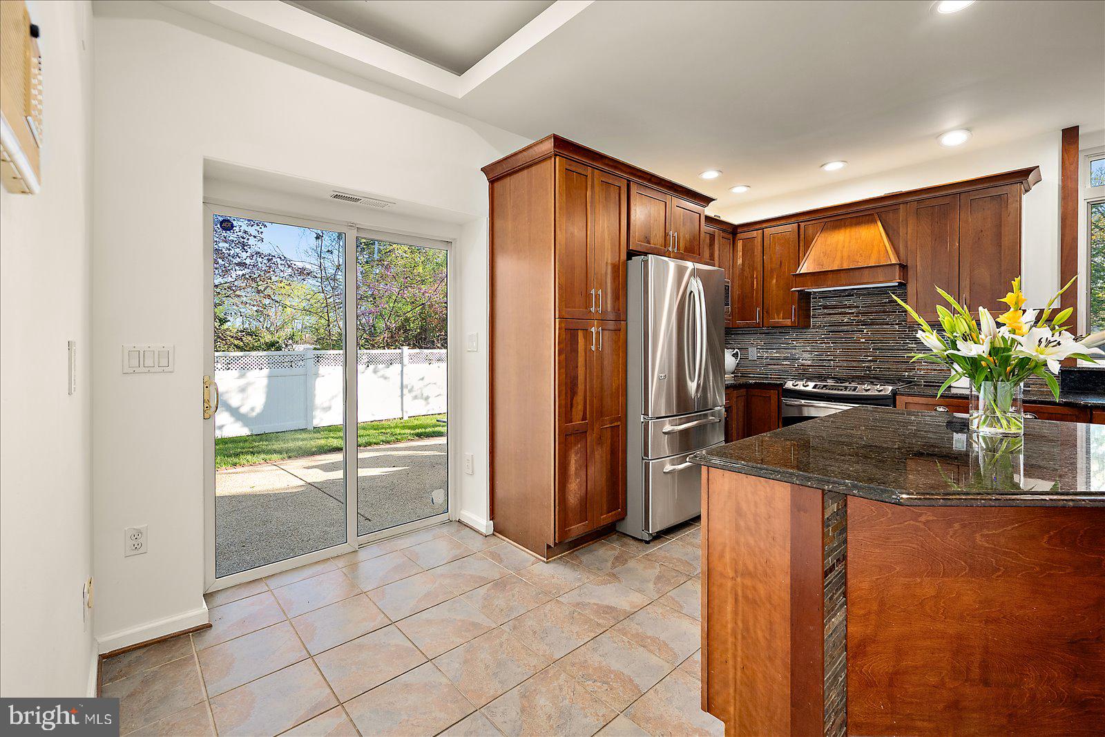 813 Shore Drive Edgewater, MD 21037 - Photo 15 of 64 a kitchen with stainless steel appliances a refrigerator and a counter
