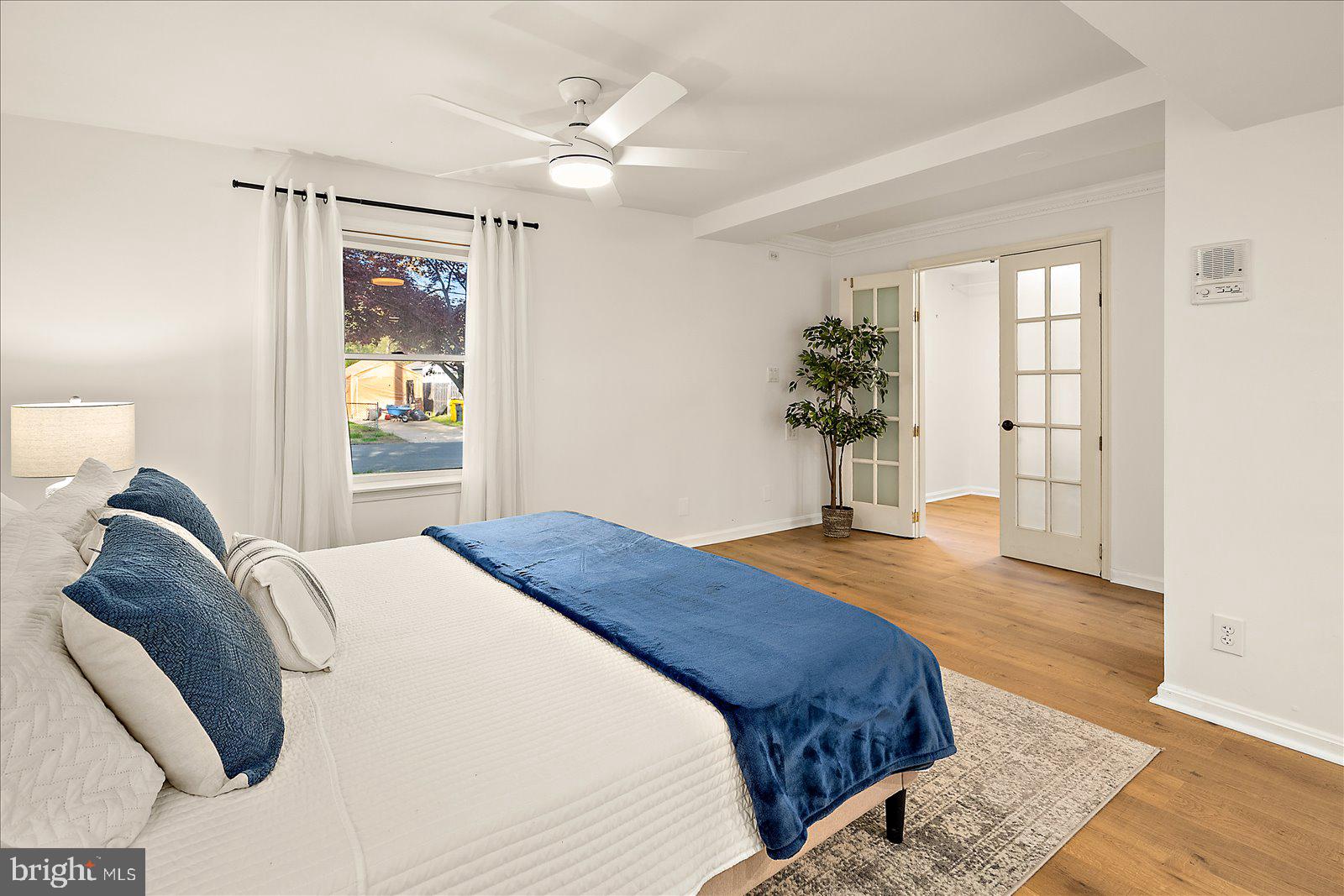 813 Shore Drive Edgewater, MD 21037 - Photo 19 of 64 a bedroom with a bed and a window