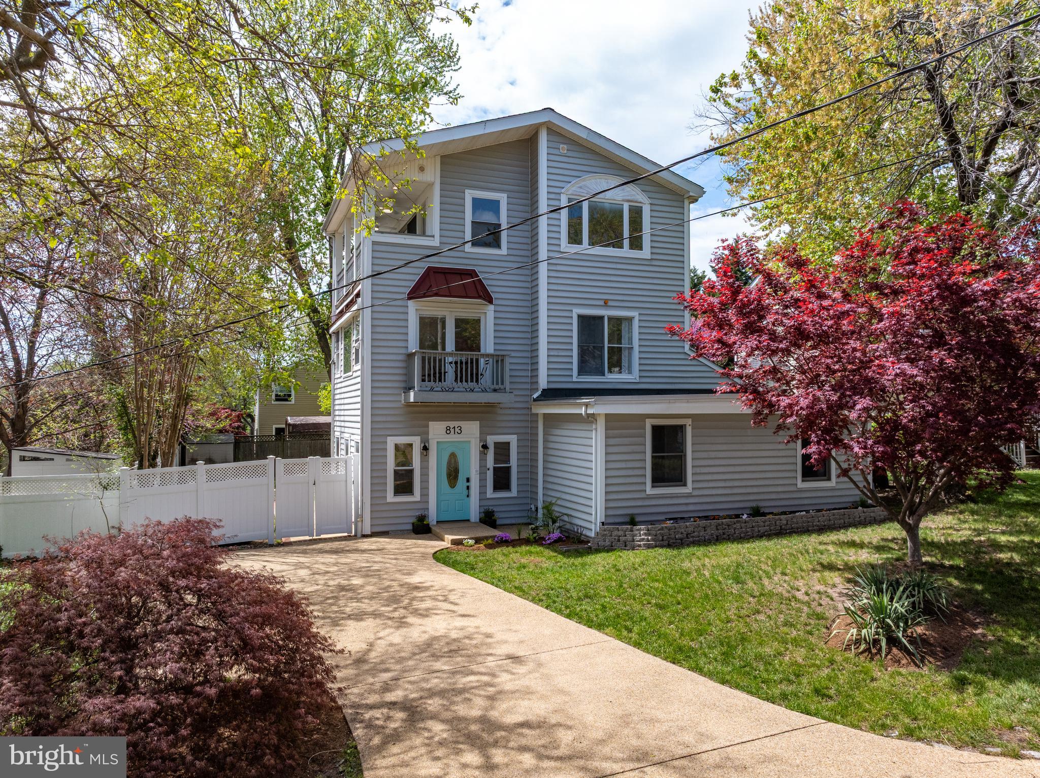 813 Shore Drive Edgewater, MD 21037 - Photo 2 of 64 a front view of house with yard and trees