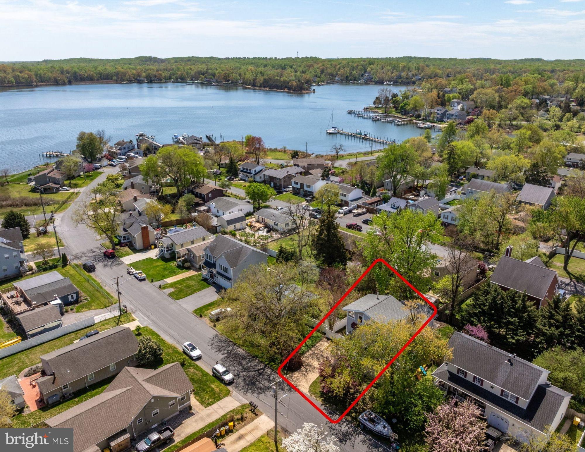 813 Shore Drive Edgewater, MD 21037 - Photo 4 of 64 an aerial view of lake and residential houses with outdoor space