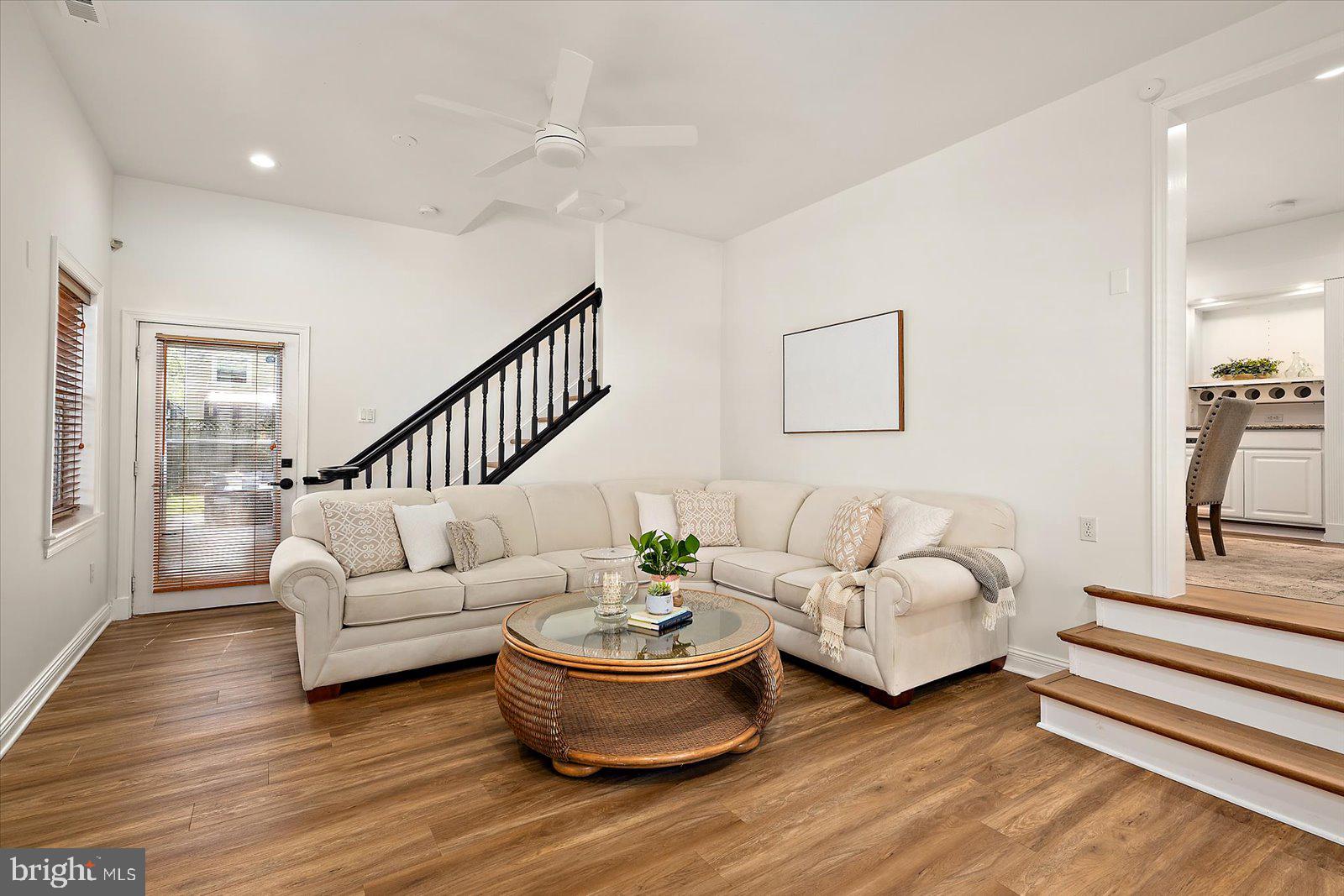 813 Shore Drive Edgewater, MD 21037 - Photo 5 of 64 a living room with furniture and wooden floor