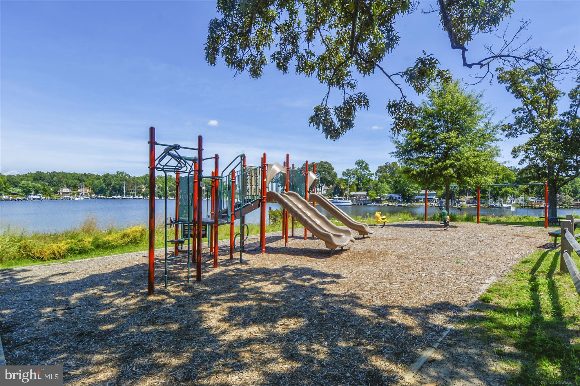 813 Shore Drive Edgewater, MD 21037 - Photo 50 of 64 a view of a park with swings and slides