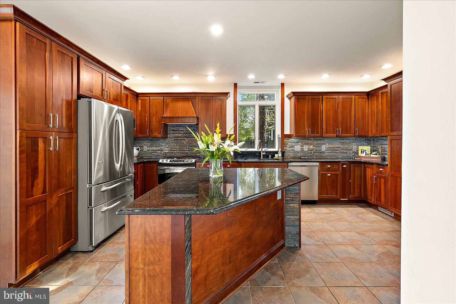 813 Shore Drive Edgewater, MD 21037 - Photo 7 of 64 a kitchen with stainless steel appliances granite countertop a sink stove and refrigerator