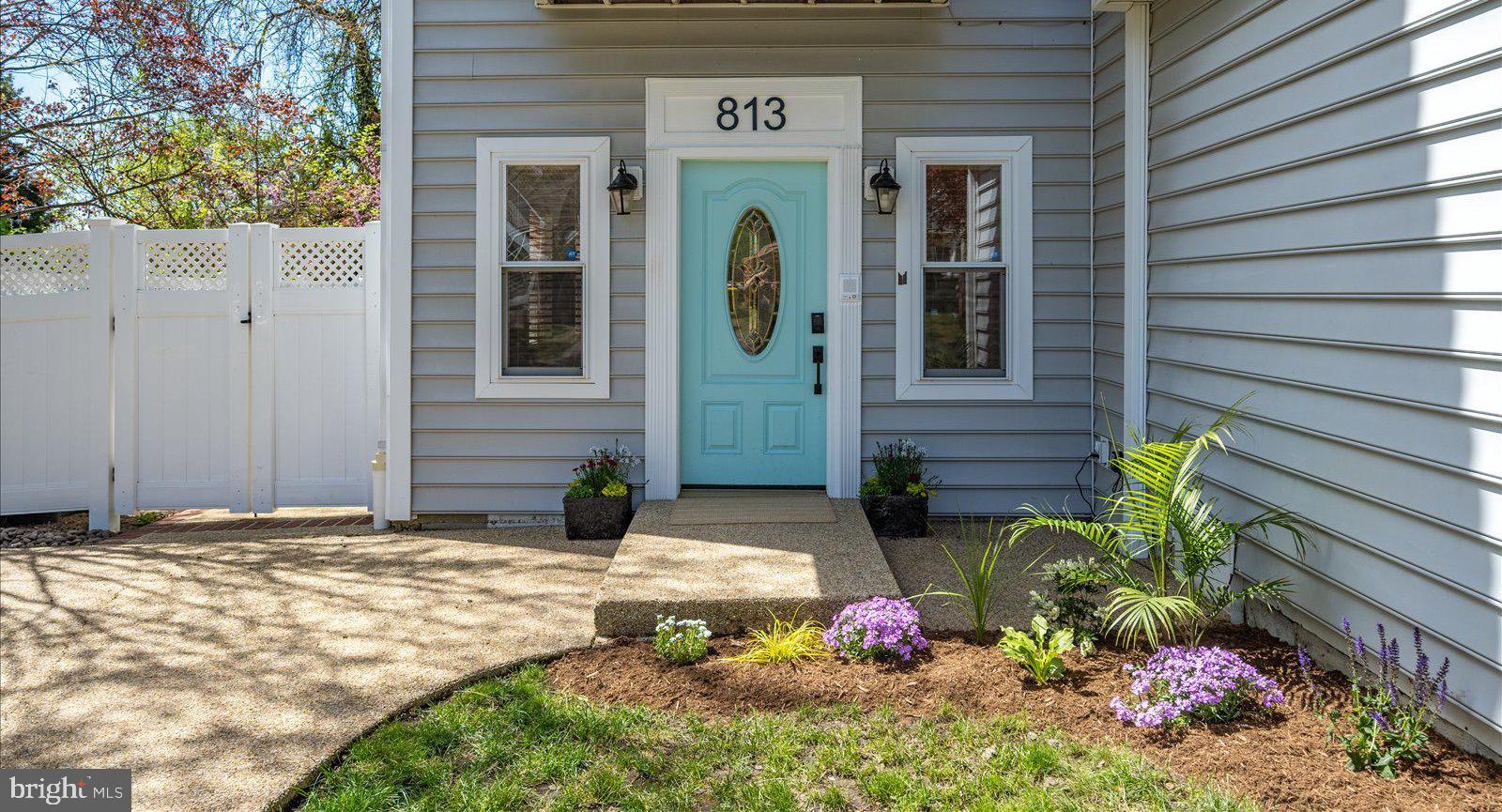 813 Shore Drive Edgewater, MD 21037 - Photo 8 of 64 a front view of a house with a yard