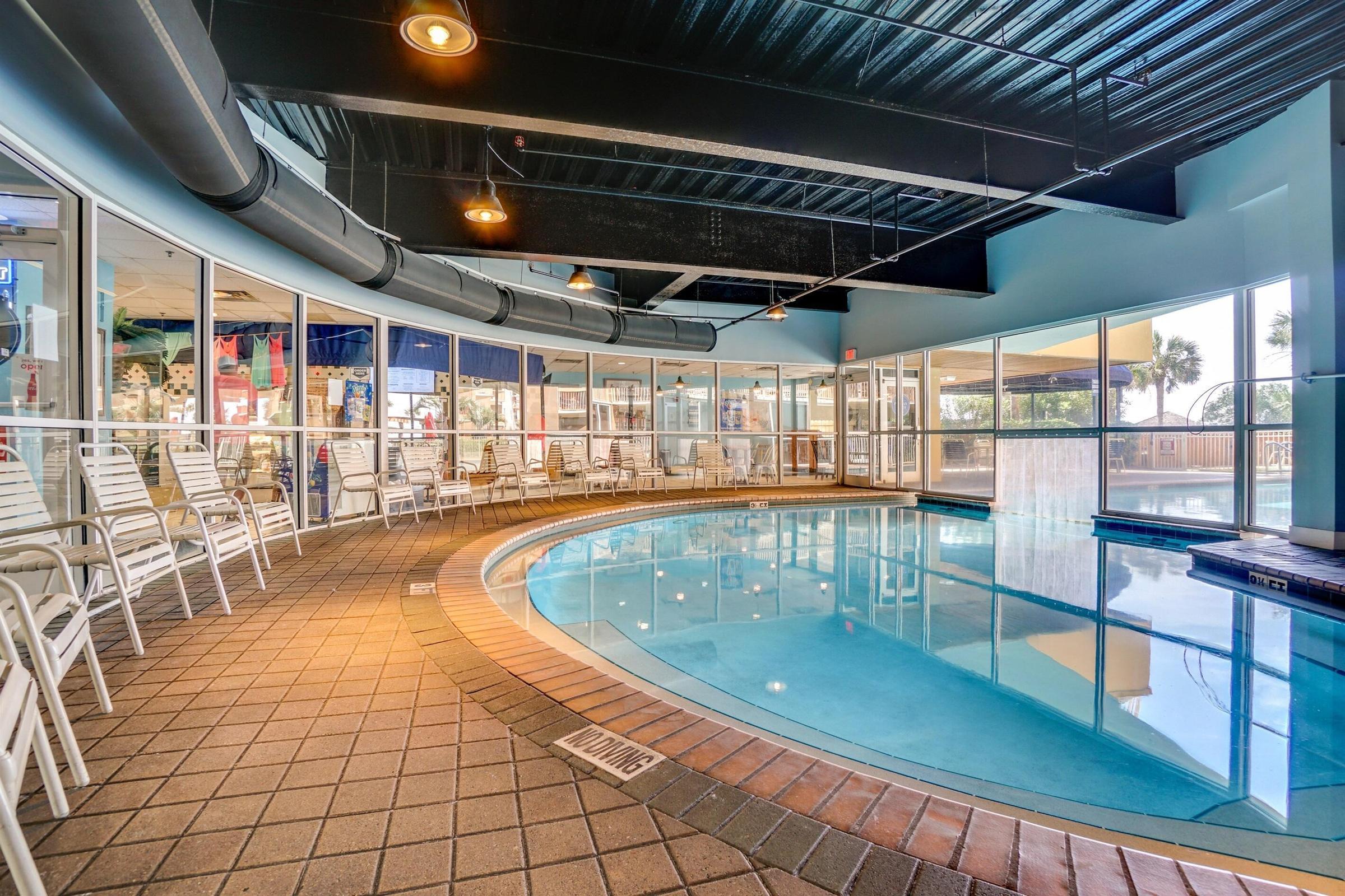 970 Highway 98, Unit 303 Destin, FL 32541 - Photo 16 of 42 a view of a swimming pool with a outdoor seating