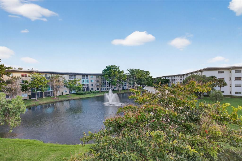 1801 Eleuthera Point, Unit D3 Coconut Creek, FL 33066 - Photo 20 of 80 a view of a lake with a city
