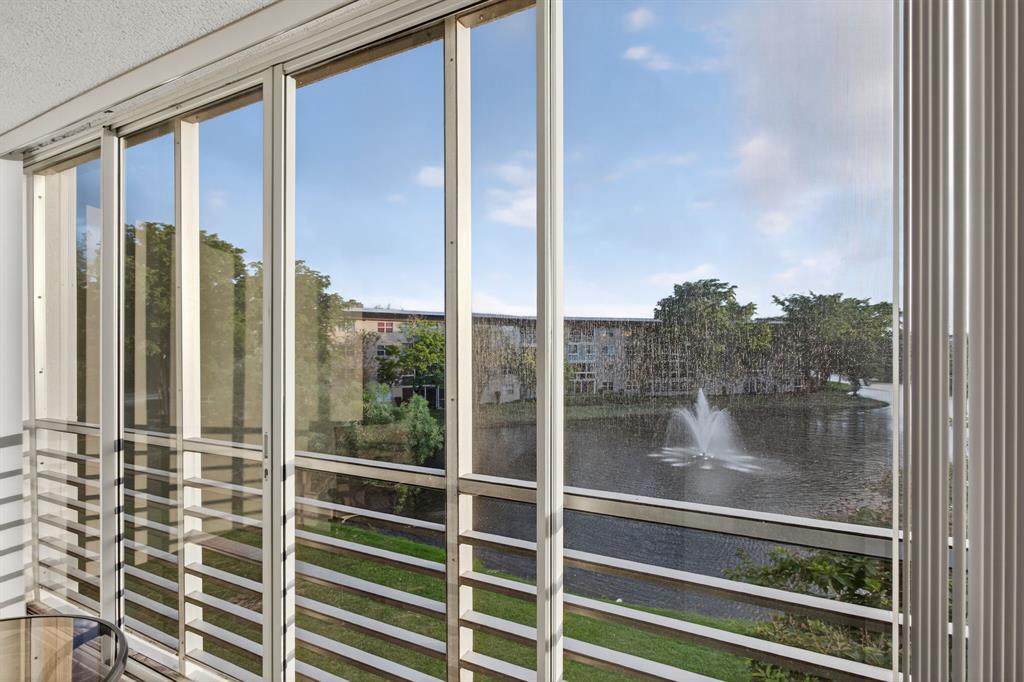 1801 Eleuthera Point, Unit D3 Coconut Creek, FL 33066 - Photo 22 of 80 a window with lake view