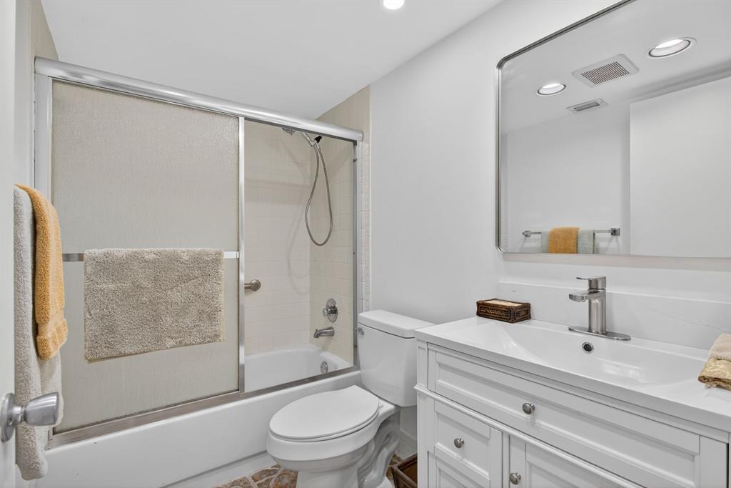 1801 Eleuthera Point, Unit D3 Coconut Creek, FL 33066 - Photo 35 of 80 a bathroom with a sink toilet and shower