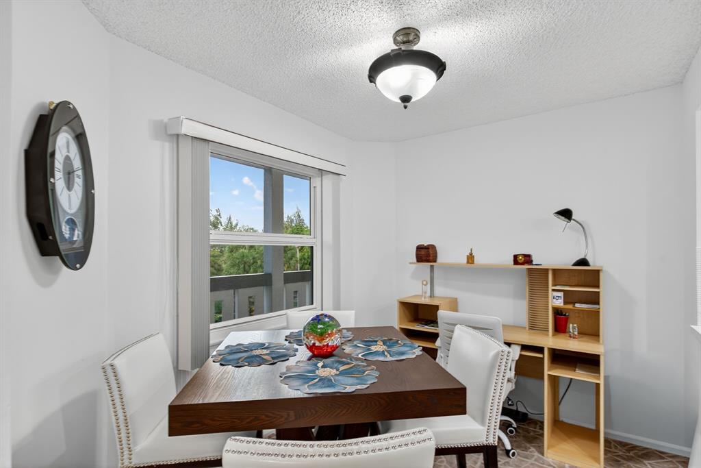 1801 Eleuthera Point, Unit D3 Coconut Creek, FL 33066 - Photo 5 of 80 a living room with furniture and a window
