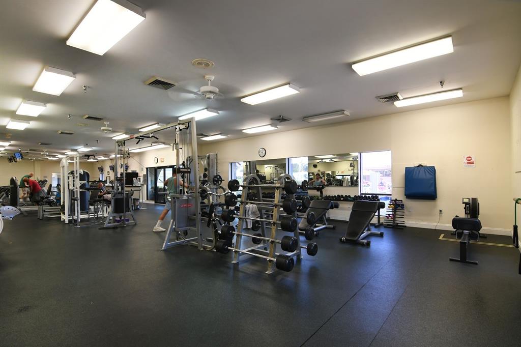 1801 Eleuthera Point, Unit D3 Coconut Creek, FL 33066 - Photo 54 of 80 a view of a room with gym equipment
