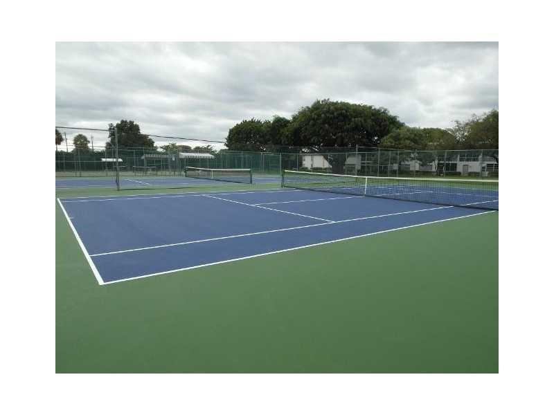1801 Eleuthera Point, Unit D3 Coconut Creek, FL 33066 - Photo 70 of 80 a picture of a tennis court