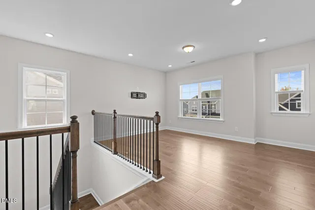 a view of entryway with wooden floor