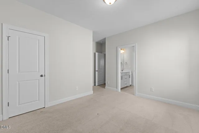 a bathroom with double vanity sink a mirror and vanity
