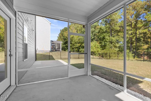 a view of a house with backyard and garden